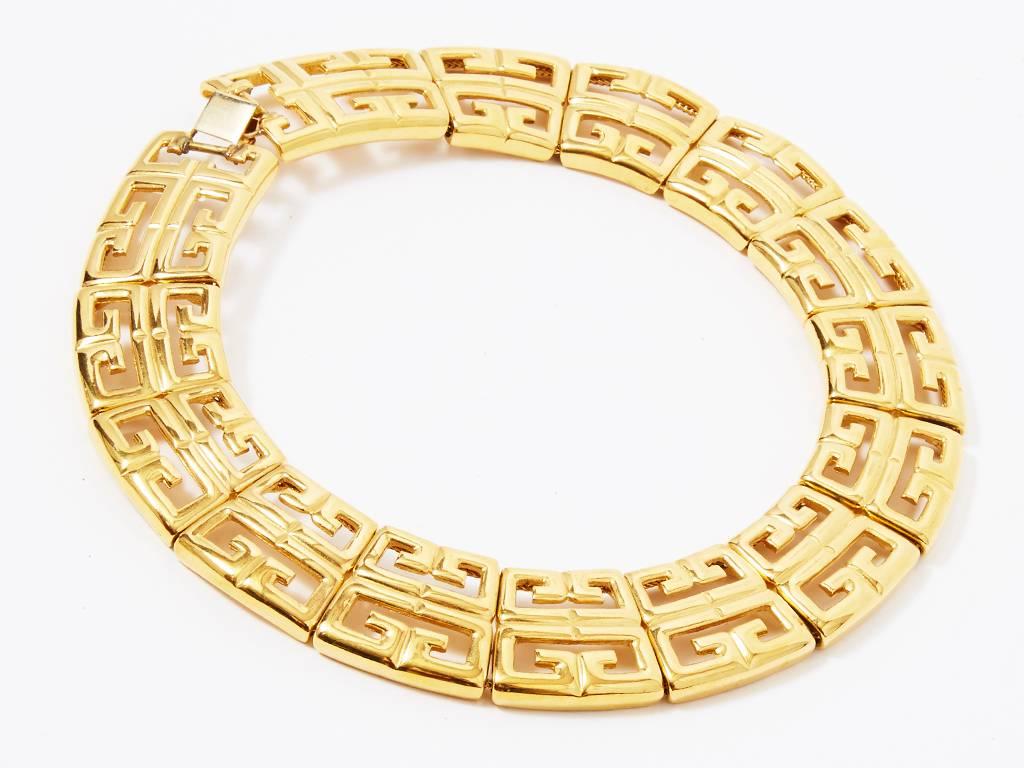 Givenchy, gold tone, collar necklace  having a signature Givenchy 