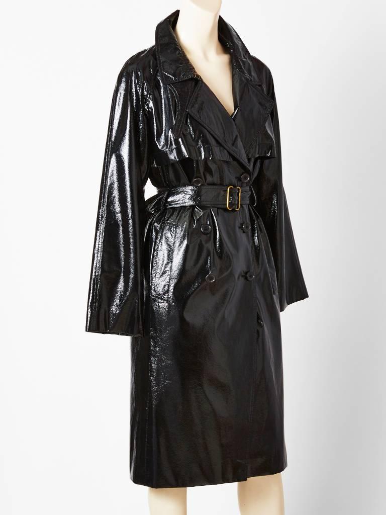 Tom Ford for YSL vinyl, double breasted, belted, trench. Very lightweight. Vinyl has a slight, crinkly, texture.