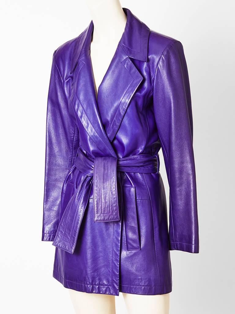 Yves Saint Laurent, purple, supple, leather, belted, 3/4 trench style jacket. Simple cut with wide lapels and side pockets.