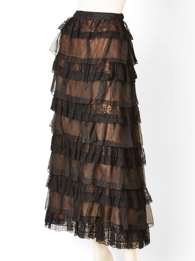 Oscar de la Renta, black organza and lace tiered evening skirt over a nude organza under skirt.  Skirt has alternate tiers of ruffled lace and organza.