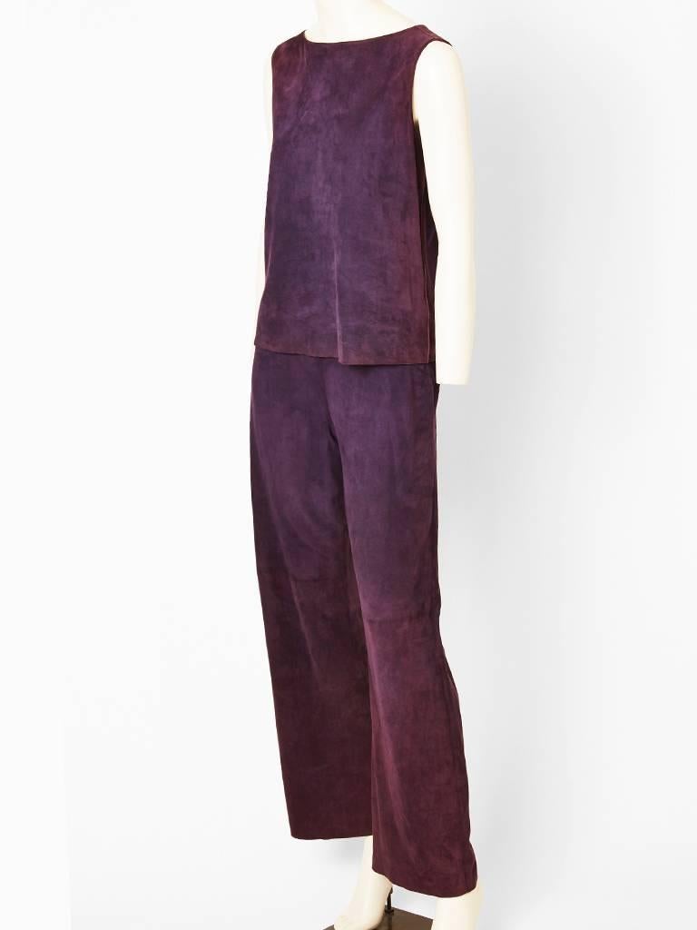 Tan Giudicelli for Hermes, aubergine, suede, sleeveless top and pant ensemble.
Suede has subtle detail of the animal hide veins on the surface, that are left on purpose, which only Hermes does. Pant zips on the side, with hip pockets.