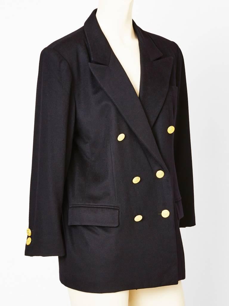 Yves Saint Laurent, black wool, classic, double breasted blazer with gold buttons.
