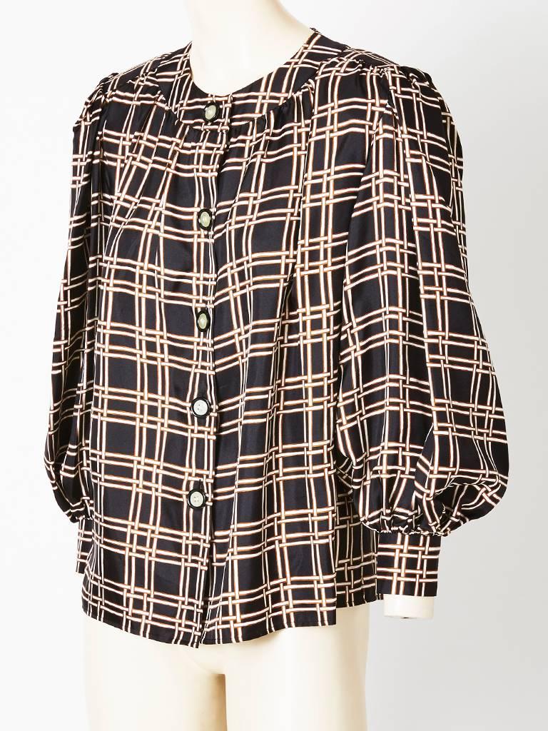 Yves Saint Laurent, silk twill , smock style blouse having a 