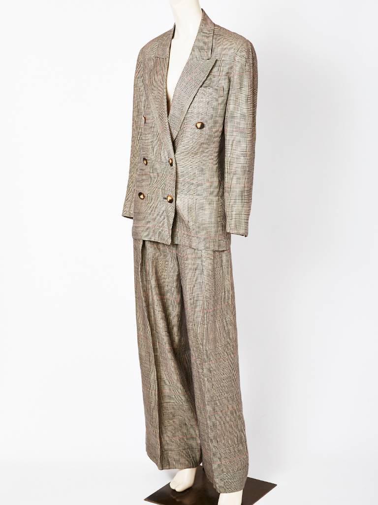 Ronaldo's Shamask, linen and wool, glen plaid, menswear inspired, double breasted pant suit having an 80's dropped shoulder and semi fitted silhouette.
Trousers are extra wide with a fly front closure.
