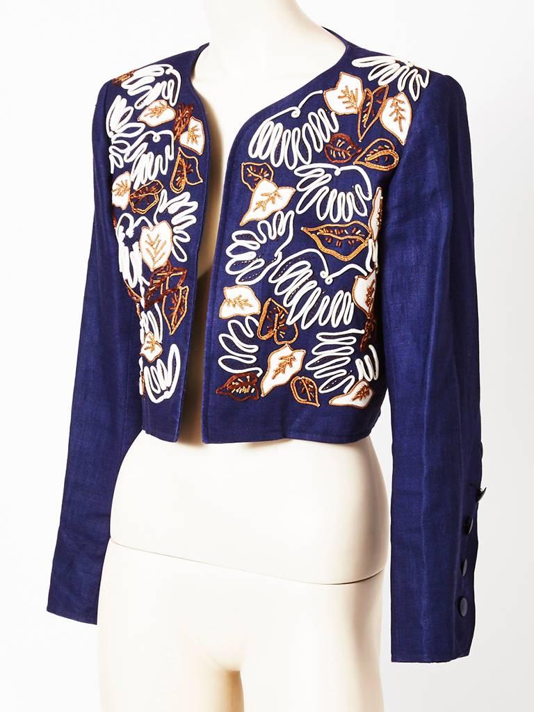 Yves Saint Laurent, navy linen, cropped, collarless jacket, having a 