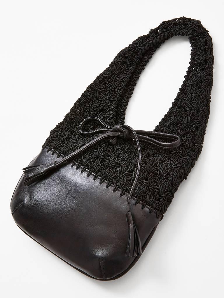 Ferragamo, black bag, having a crochet body with a black leather base.
Bag has a black leather bow embellishment.