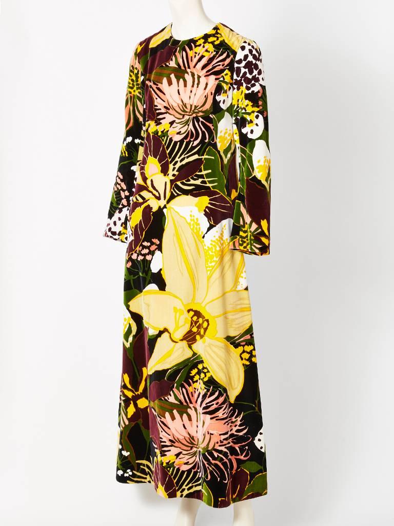 Bill Blass, colorful, bold, floral pattern, velvet, long sleeve, maxi dress, having no collar and an A line silhouette. Dress comes with detachable, peter pan collar.
C. 1970's.