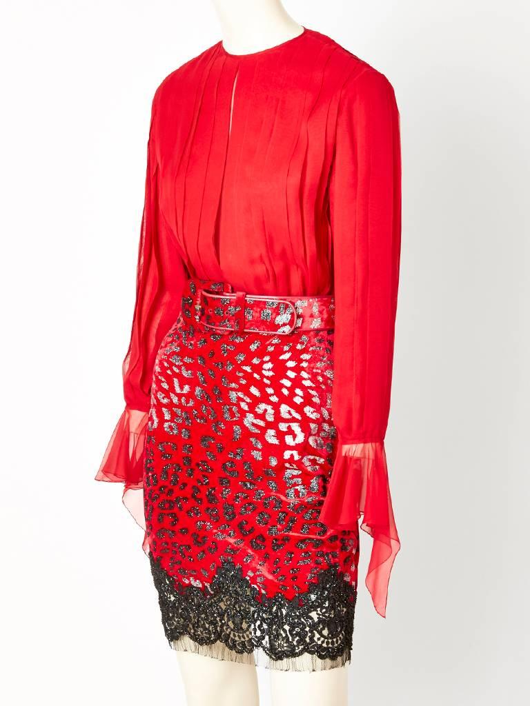 Galanos, red, chiffon and panne velvet cocktail dress. Bodice and sleeves have signature, Galanos, vertical, chiffon pleating with a center slit that extends to the waist. The cuffs 