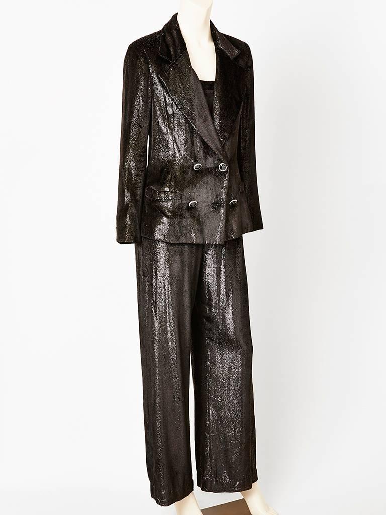 Adolfo, black, panne velvet with some silver lurex, 3 piece, tuxedo, having a double breasted jacket embellished with jet and rhinestone buttons, a camisole, underpinning and a wide legged pant. C. late 70's