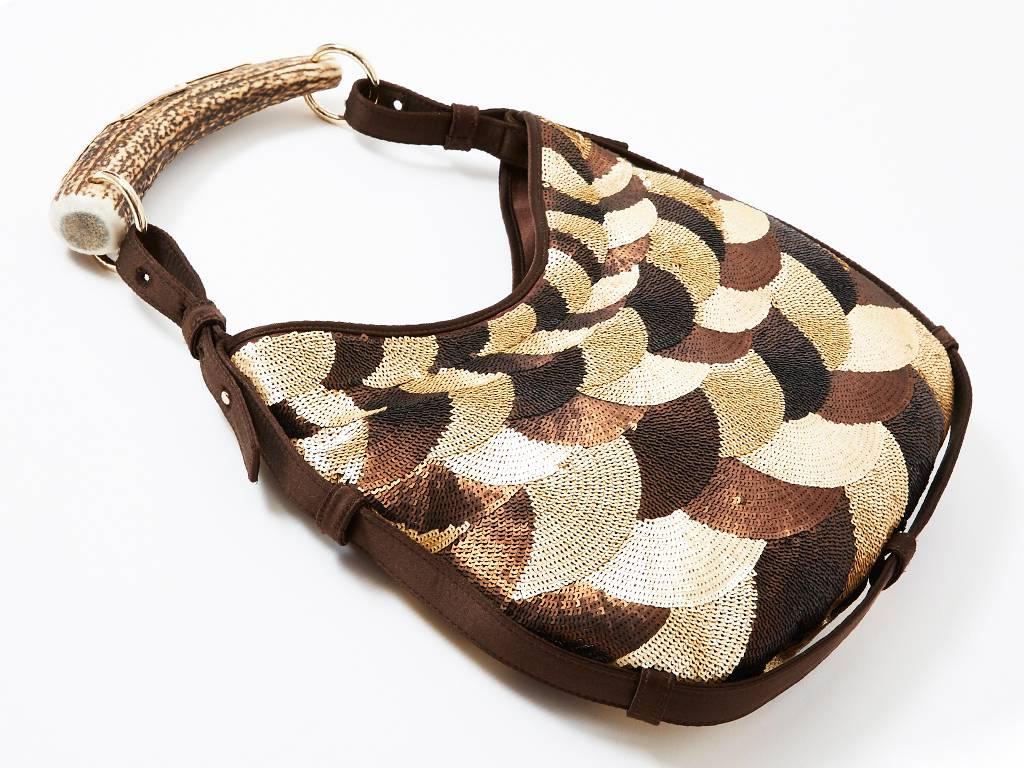 Tom Ford for Yves Saint Laurent, Mombasa bag, in tones of coppers and beige. 
Bag is entirely encrusted with sequins in a clam shell pattern.  Interior is brown satin as well as the exterior trim. Handle is made of horn. New with tags.