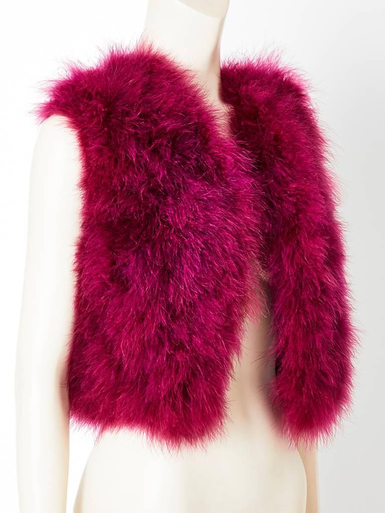 Sonia Rykiel, fuschia tone, marabou vest, having a satin back. Label reads: Sonia Rykiel, chez Henry Bendel. It was one of her first venues in New York in the late 70's before opening her own boutque on Madison Avenue.