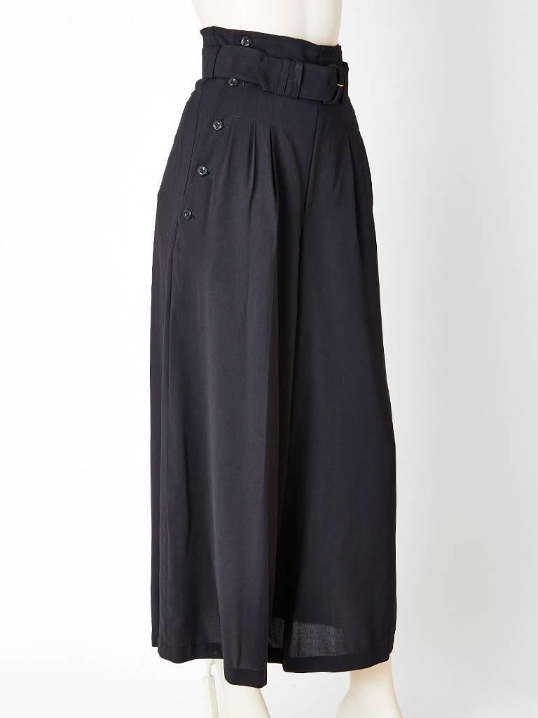 Matsuda, high waisted, belted, wide leg trousers, having sailor style side button detail at each hip. Fly front, men's style with pleats at the hip. 