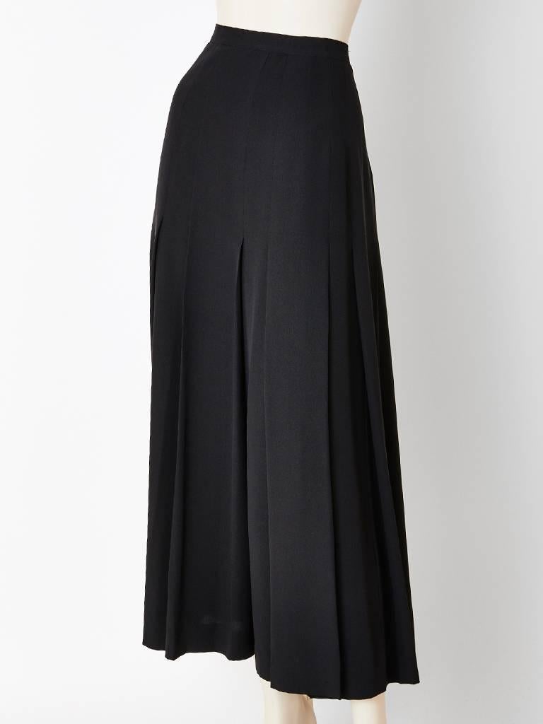 Chanel, box pleated, crepe de chine, long evening skirt having stitched down pleats from the stomach the waist to lower hip.