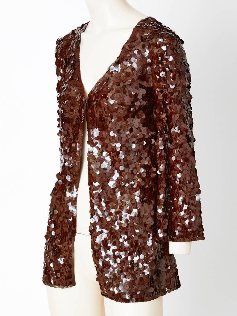 Sonia Rykiel, chocolate brown, cardigan, encrusted with large size paiettes. Jacket has a V neckline with a single hook and eye closure. C. Late 70's. 