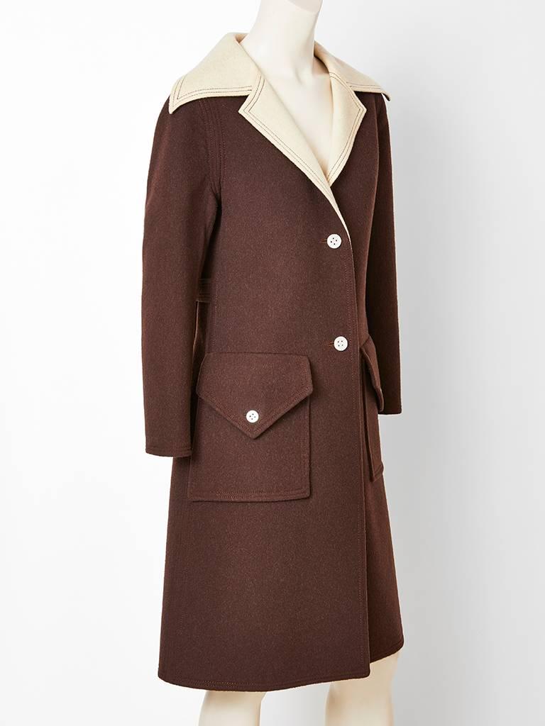 Galanos, chocolate brown and Ivory, double face wool fitted,  A line shape, coat, having a wide notched collar and deep side flap pocket detail.