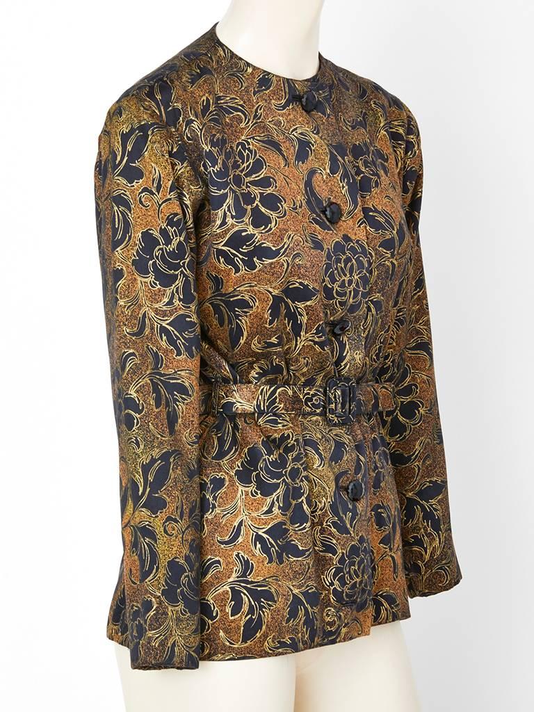 Yves Saint Laurent Couture, floral pattern in a copper tone, with gold detail, collarless belted , semi fitted  evening  jacket. Black faceted jet button closures.