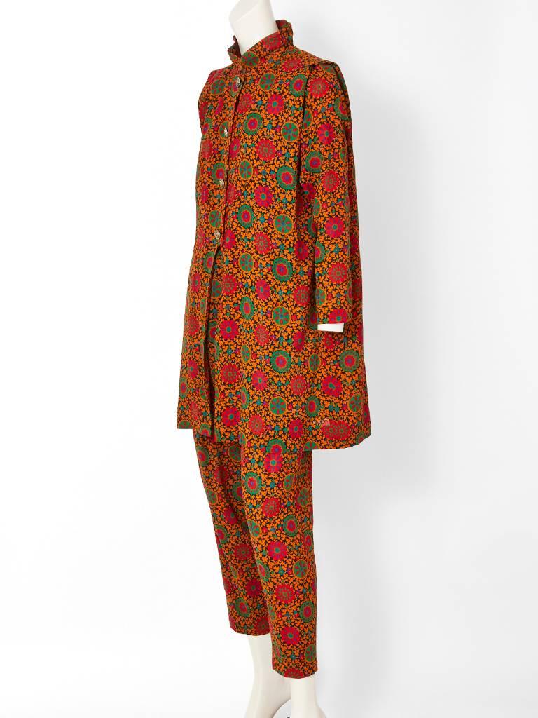 Yves Saint Laurent, RIve Gauche , wool challis long shirt and pant ensemble. Redish orange tone with olive green, patterned,  wool challis long tunic with a Mandarin collar and front button closure that stops by the waistline, exposing the matching