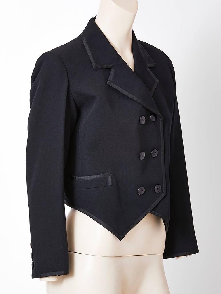 Yves Saint Laurent, black wool, Spenser style, double breasted, cropped jacket,  edged in a black flat trim. Can be considered a tuxedo jacket.