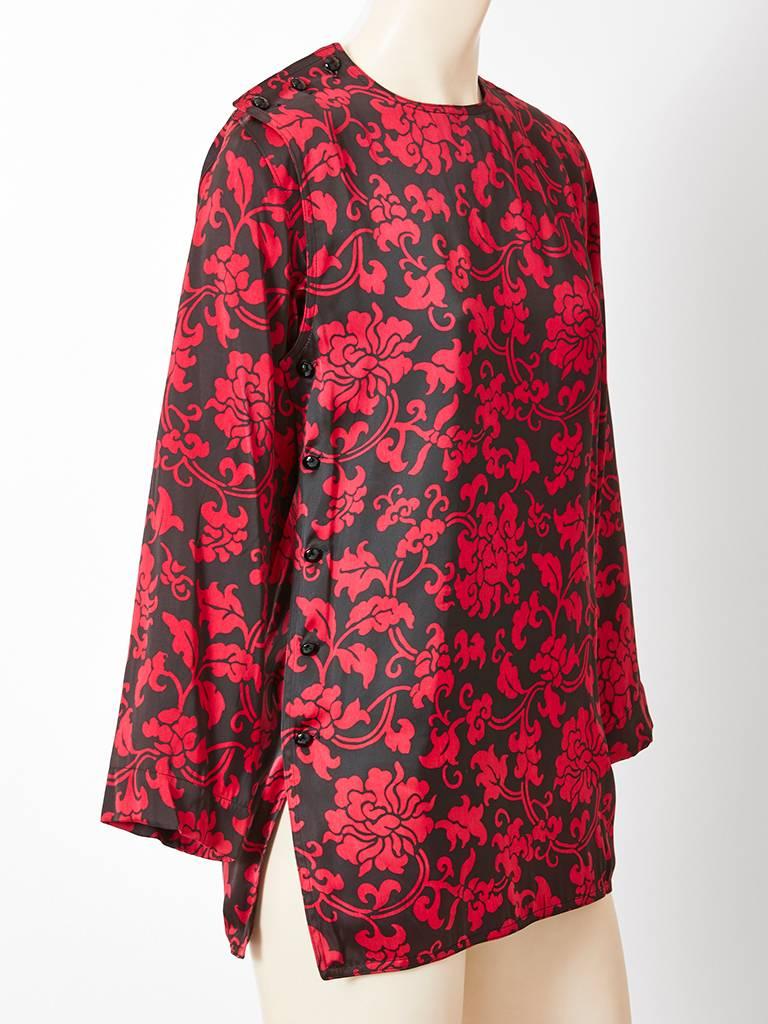 Yves Saint Laurent, RIve Gauche, red and black, chrysanthemum pattern tunic from his Chinese Collection. Tunic has button closure on the right shoulder.