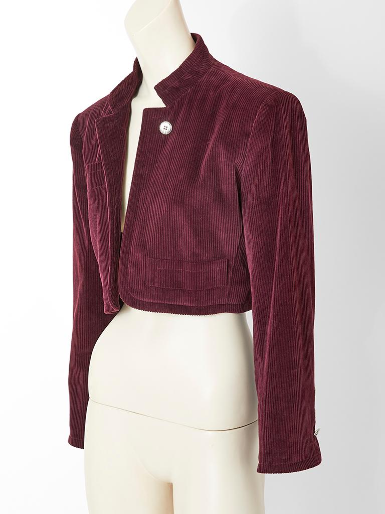 Yves Saint Laurent, Rive Gauche, plum colored, notch collared,  cropped, corduroy jacket  with a single button closure at the neck and pocket detail.