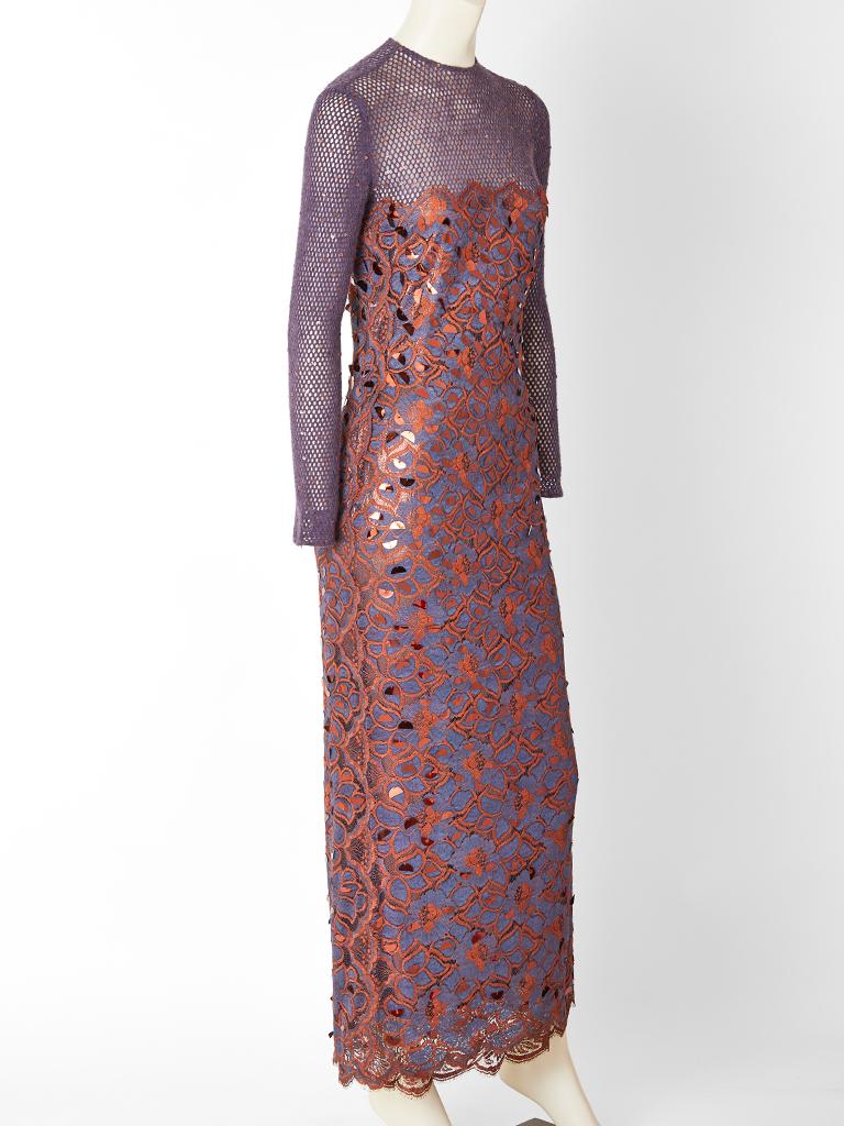 Geoffrey Beene, multi textured, evening gown having an open knit top that sits above the bust, with a jewel neckline and long sleeves Top is embellished with tiny copper sequins. The balance of the dress
is  in copper colored lace that sits over