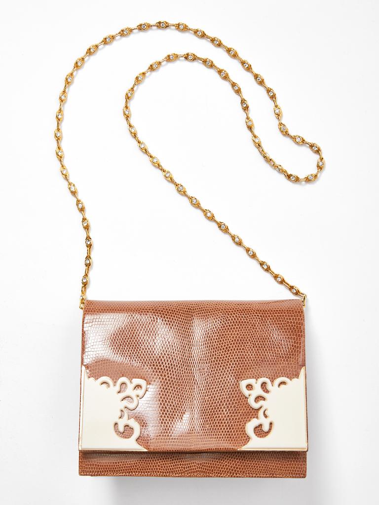 Valentino, camel tone, lizard shoulder bag have a gold tone chain and embellished faux ivory cornet