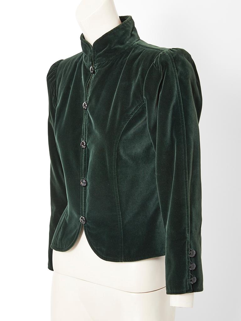 Yves Saint Laurent, Rive Gauche,  bottle green, fitted velvet jacket, having a Mandarin collar, front closures and curved hem detail at the center front.