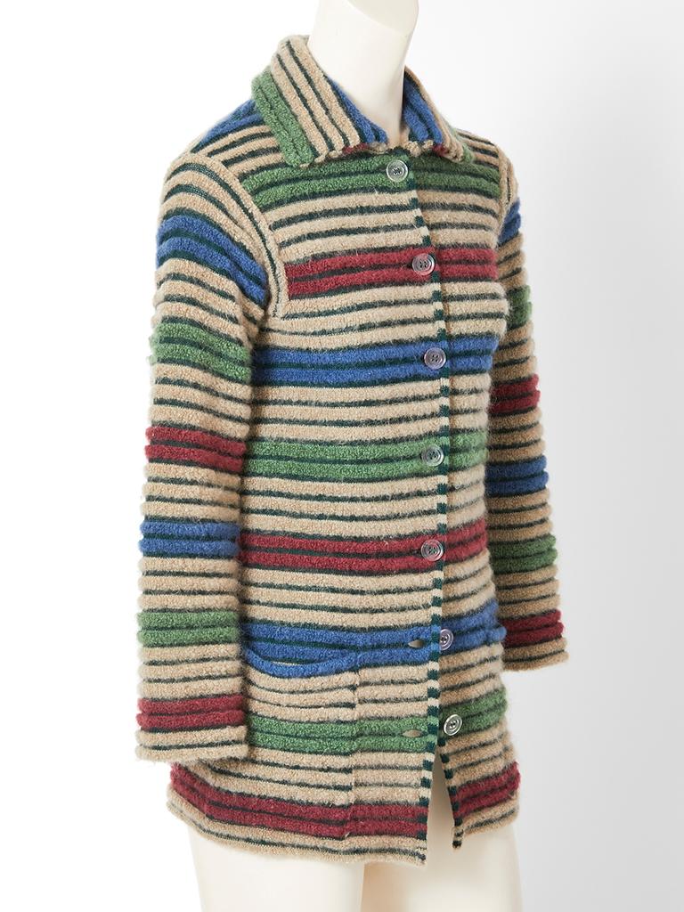 Missoni, horizontal, multi toned, ribbed knit cardigan having a pointed collar and two front patch packets.