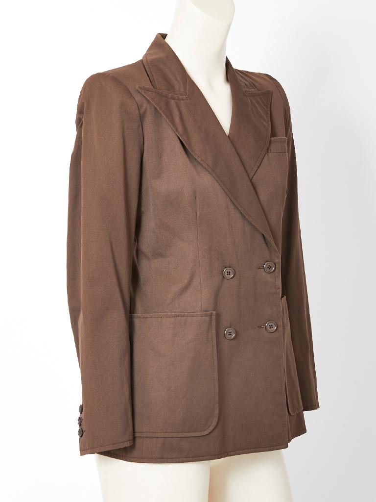 Yves Saint Laurent, chocolate brown,  cotton gaberdine, double breasted, fitted Blazer having notched lapels and large patch side pockets. C. 1970's.