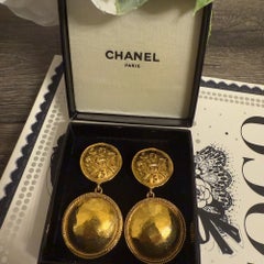 CHANEL Vintage Gold Lion "CHANEL" Motif Circle Dangle Clip On Earrings