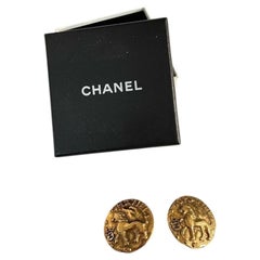 CHANEL Vintage 1980’s‎ Gold Plated CC Lion Coin Earrings