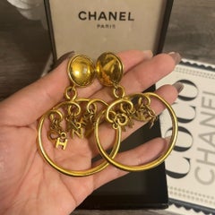 Chanel Vintage Gold "CHANEL" Letters Dangle Clip On Earrings