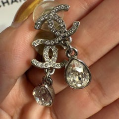 CHANEL Silver Crystal CC Teardrop Dangle Clip On Earrings