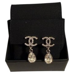 CHANEL Silver Crystal CC Teardrop Dangle Clip On Earrings