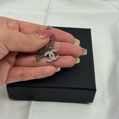 Classic CHANEL Silver Crystal CC Logo Pendant Necklace