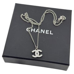 Classic CHANEL Silver Crystal CC Logo Pendant Necklace