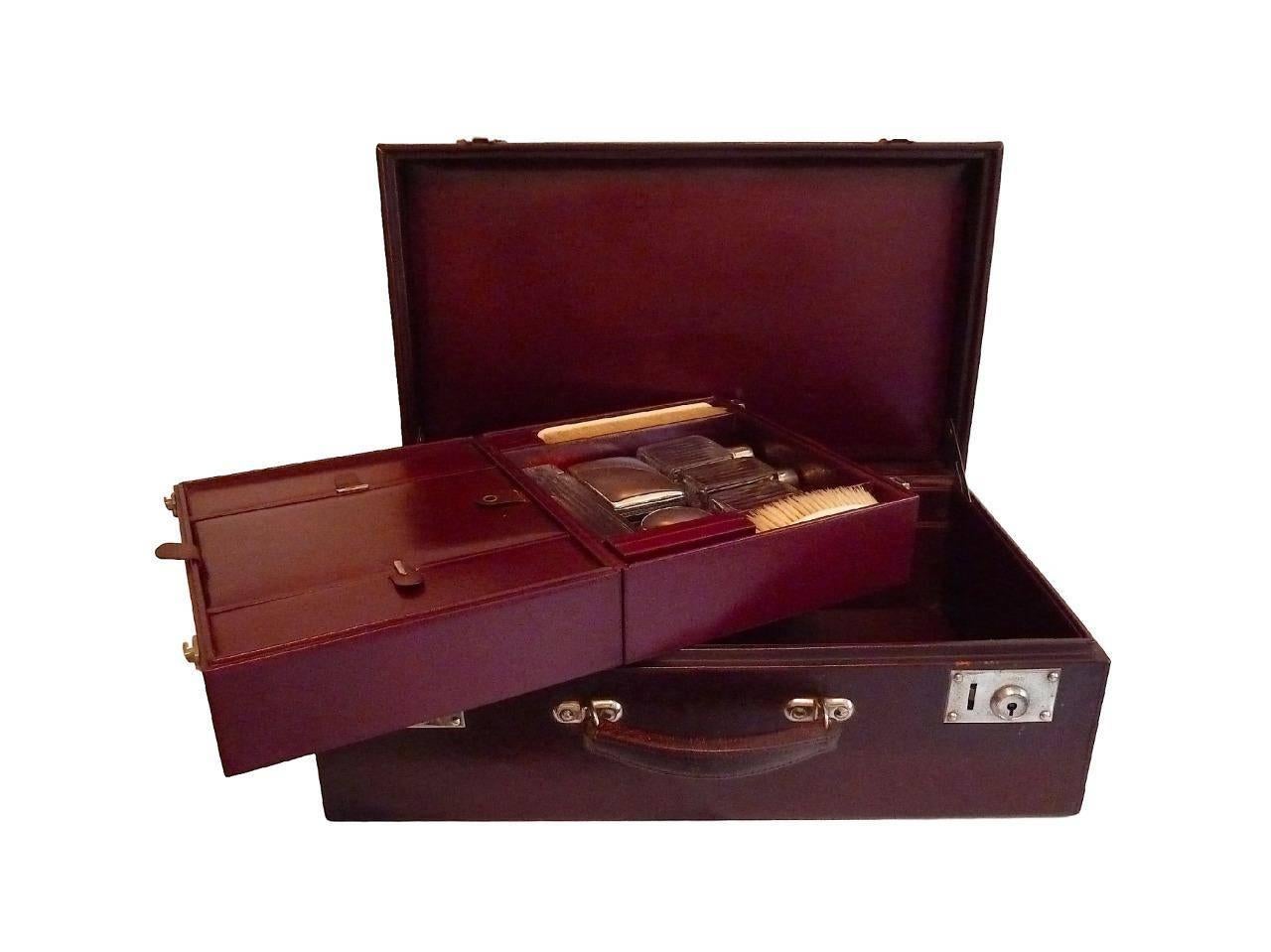 A very rare and exceptional Louis Vuitton Double traveling case from when traveling in style was the order of the day. This rare 