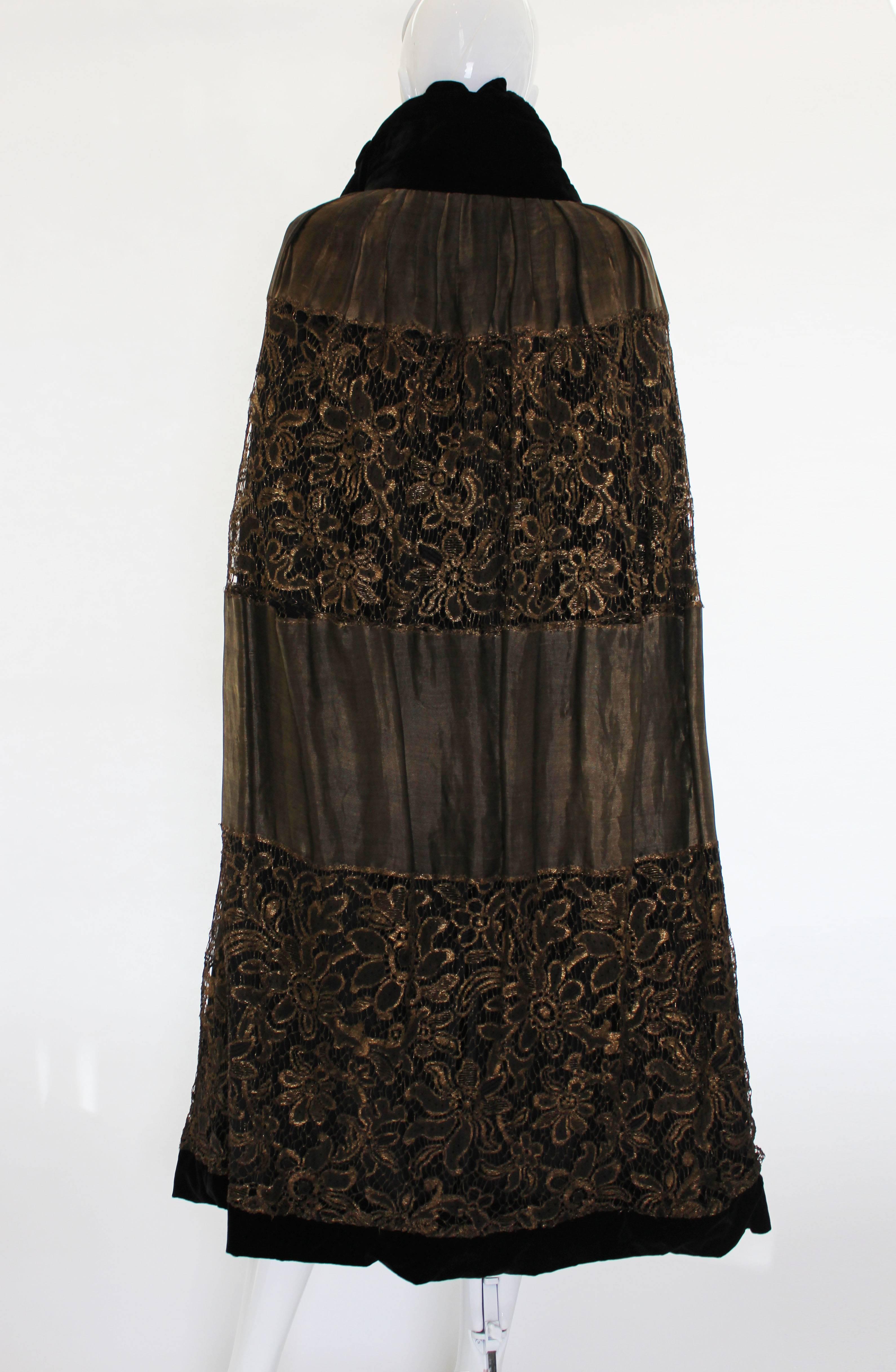 black and gold cape