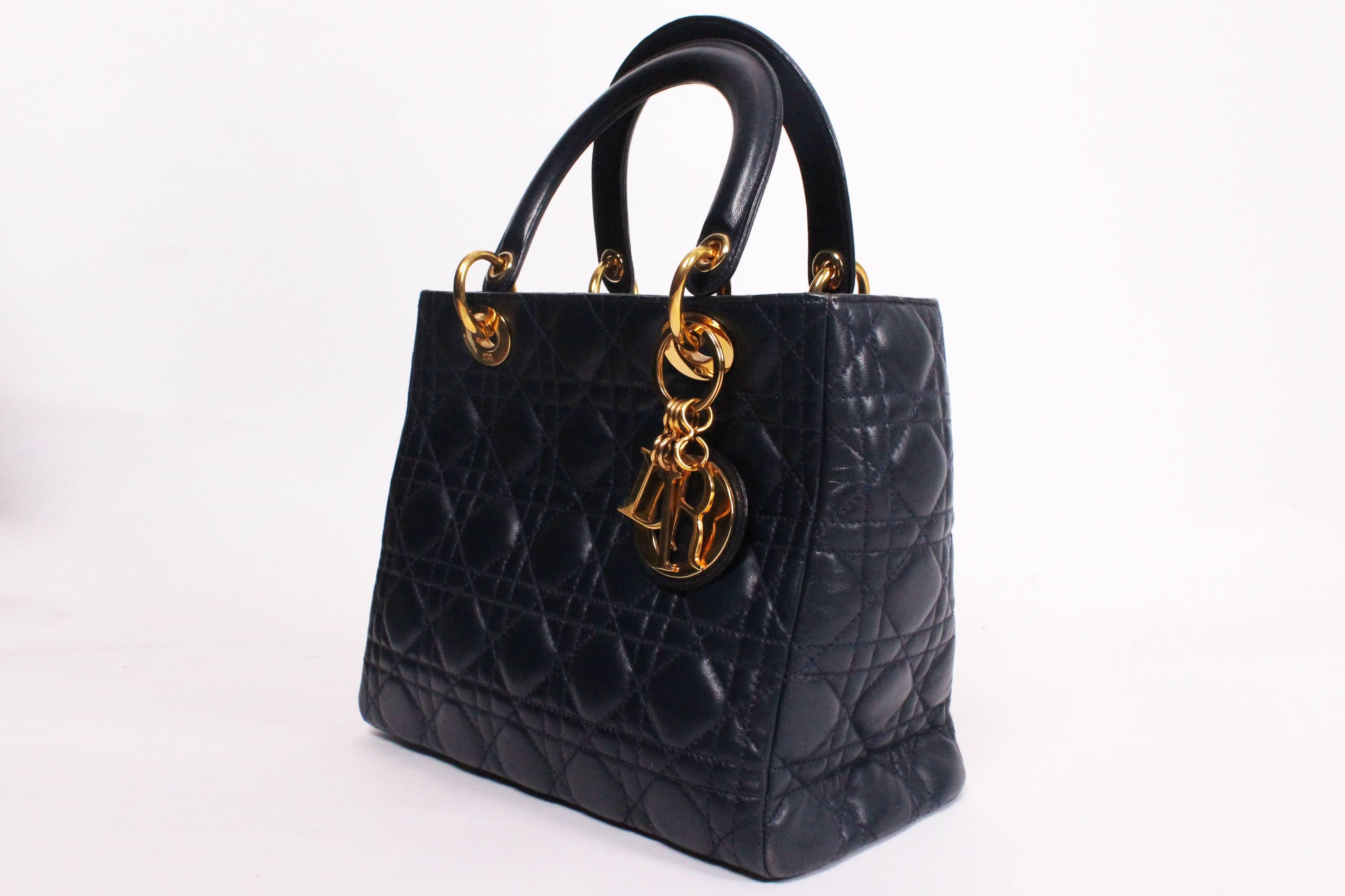 Black Christian Dior D bag in Navy leather.