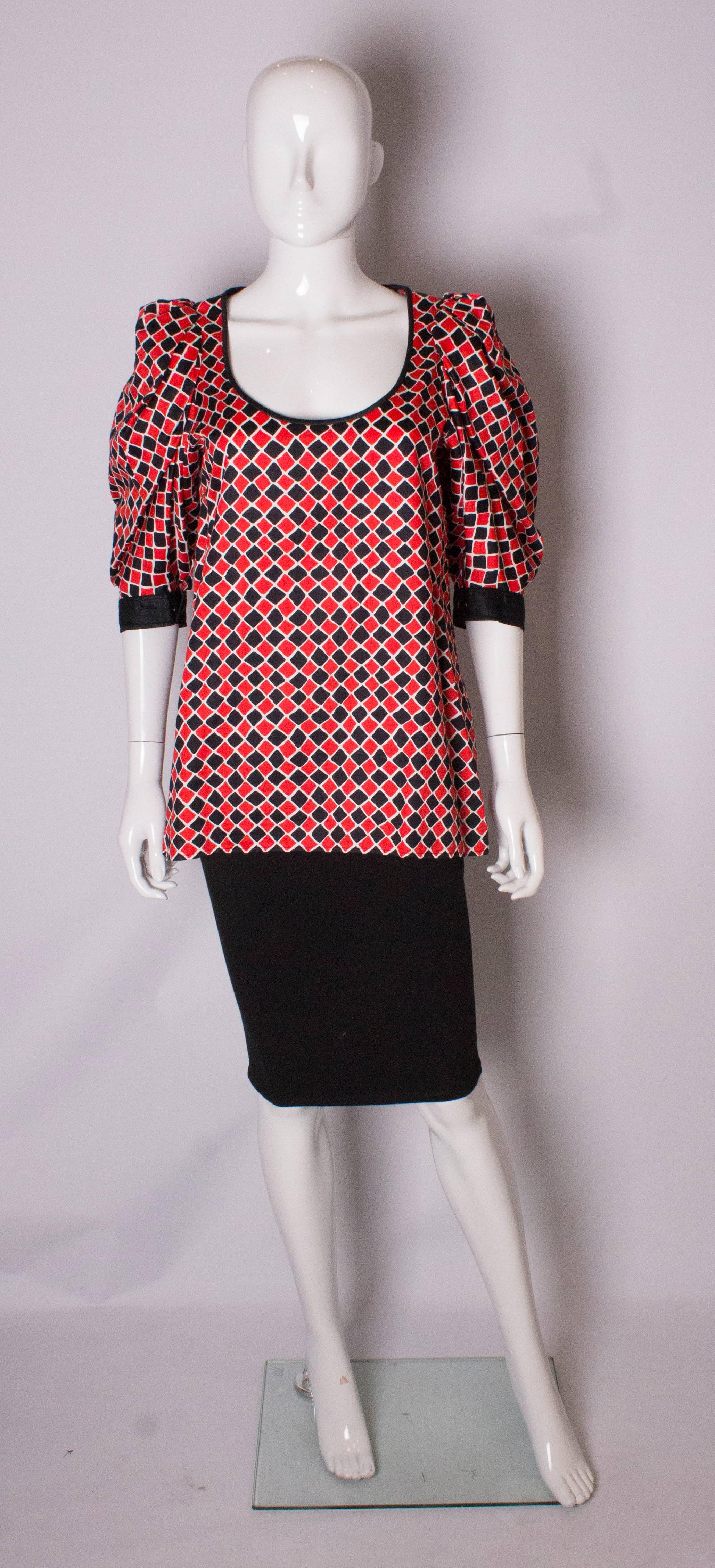 red black and white print blouse
