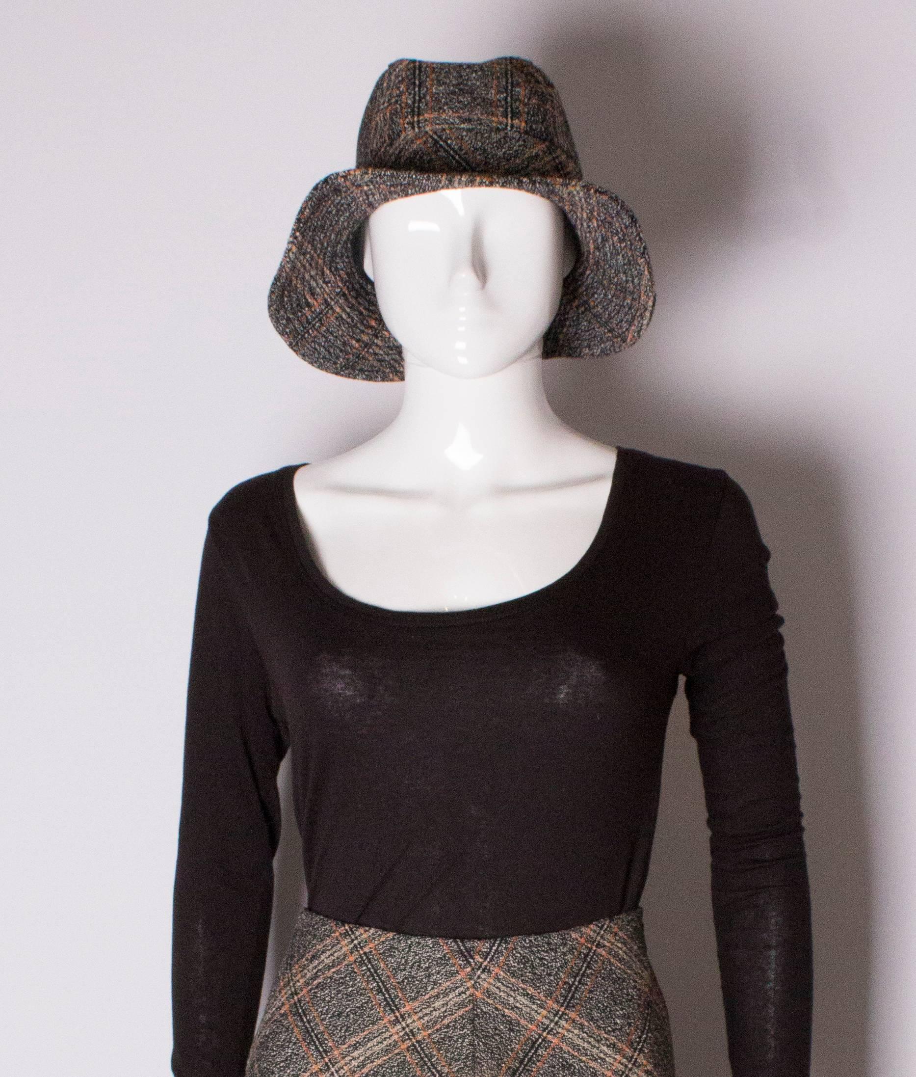 A great hat and skirt from Biba. The skirt is A line, with a central back zip. The inner circumference of the hat is 20''.
