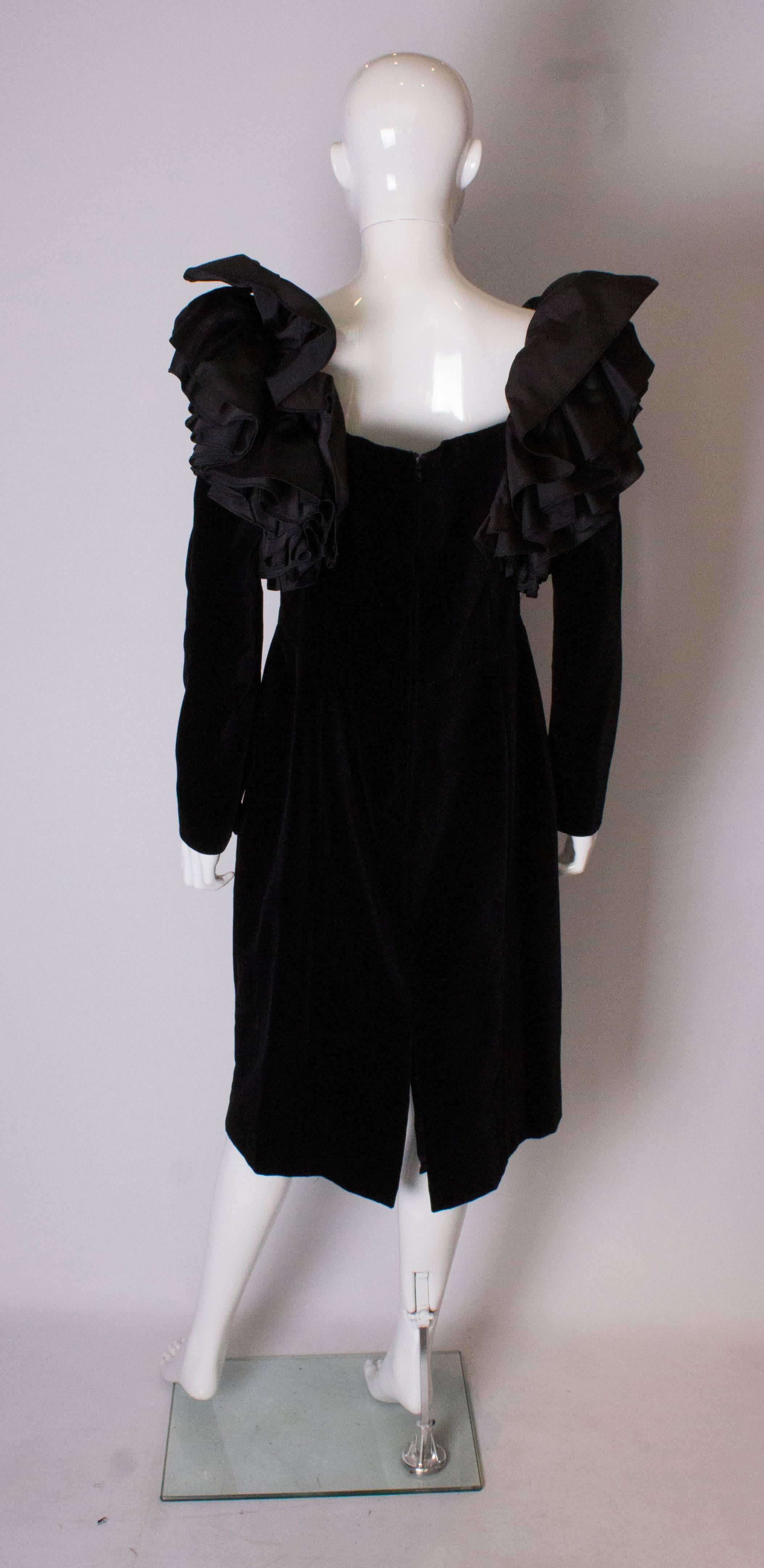 Women's A Vintage 1980s dramatic sleeve black cocktail dress by Gina Fratini  For Sale