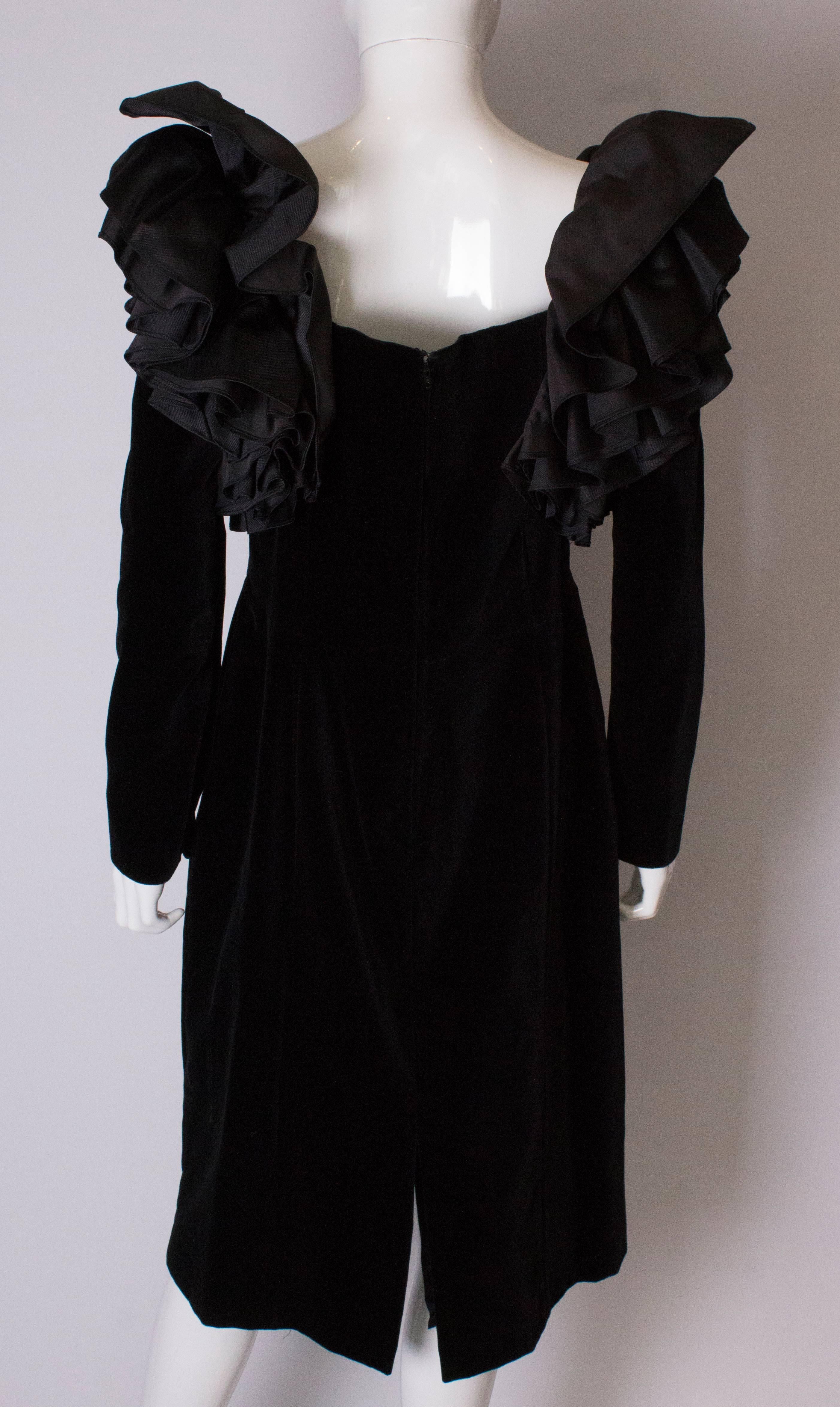 A Vintage 1980s dramatic sleeve black cocktail dress by Gina Fratini  For Sale 1