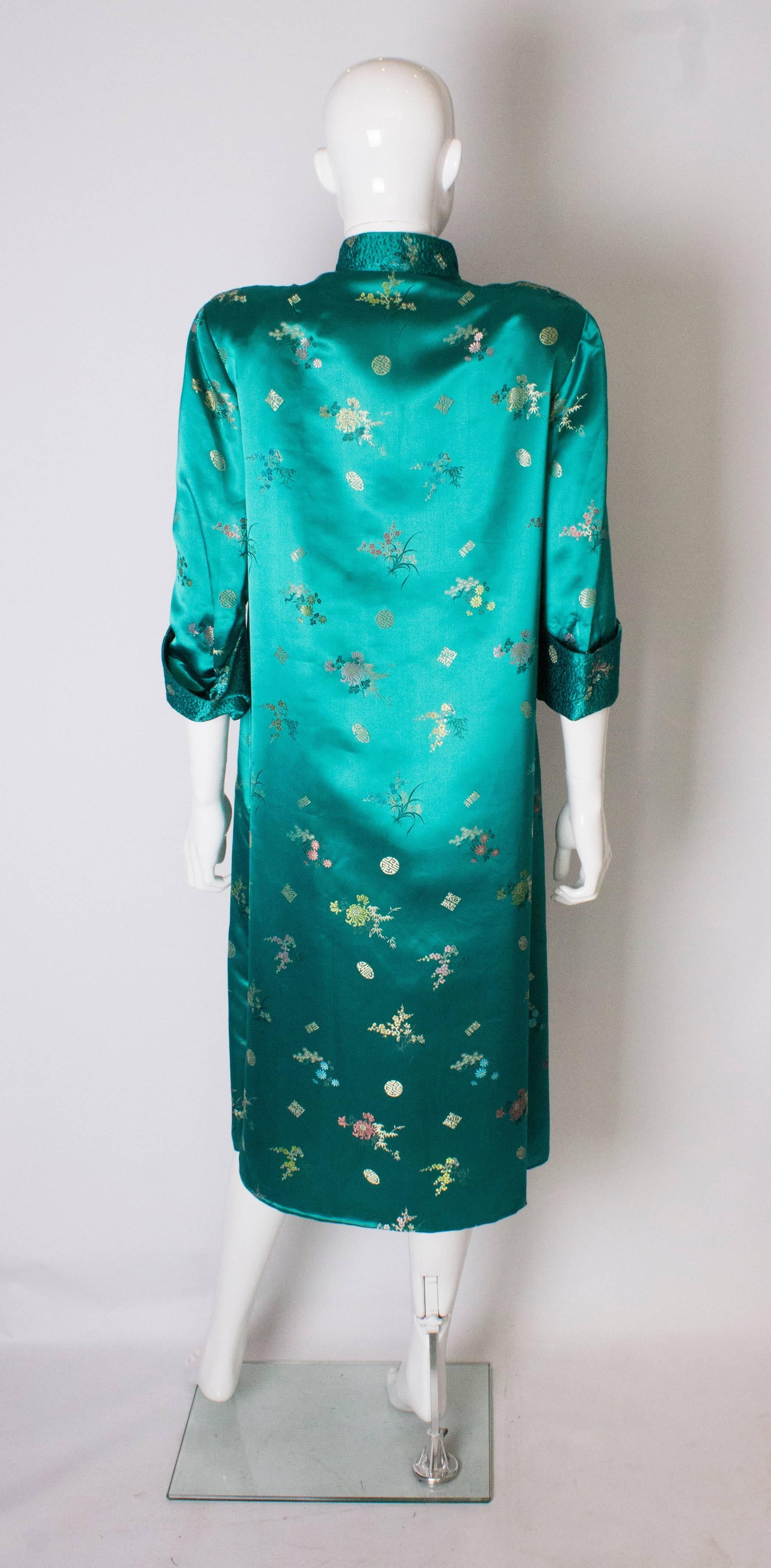 A Vintage 1970s turquoise Chinese Coat with Standup Collar & Decorative Pockets 2