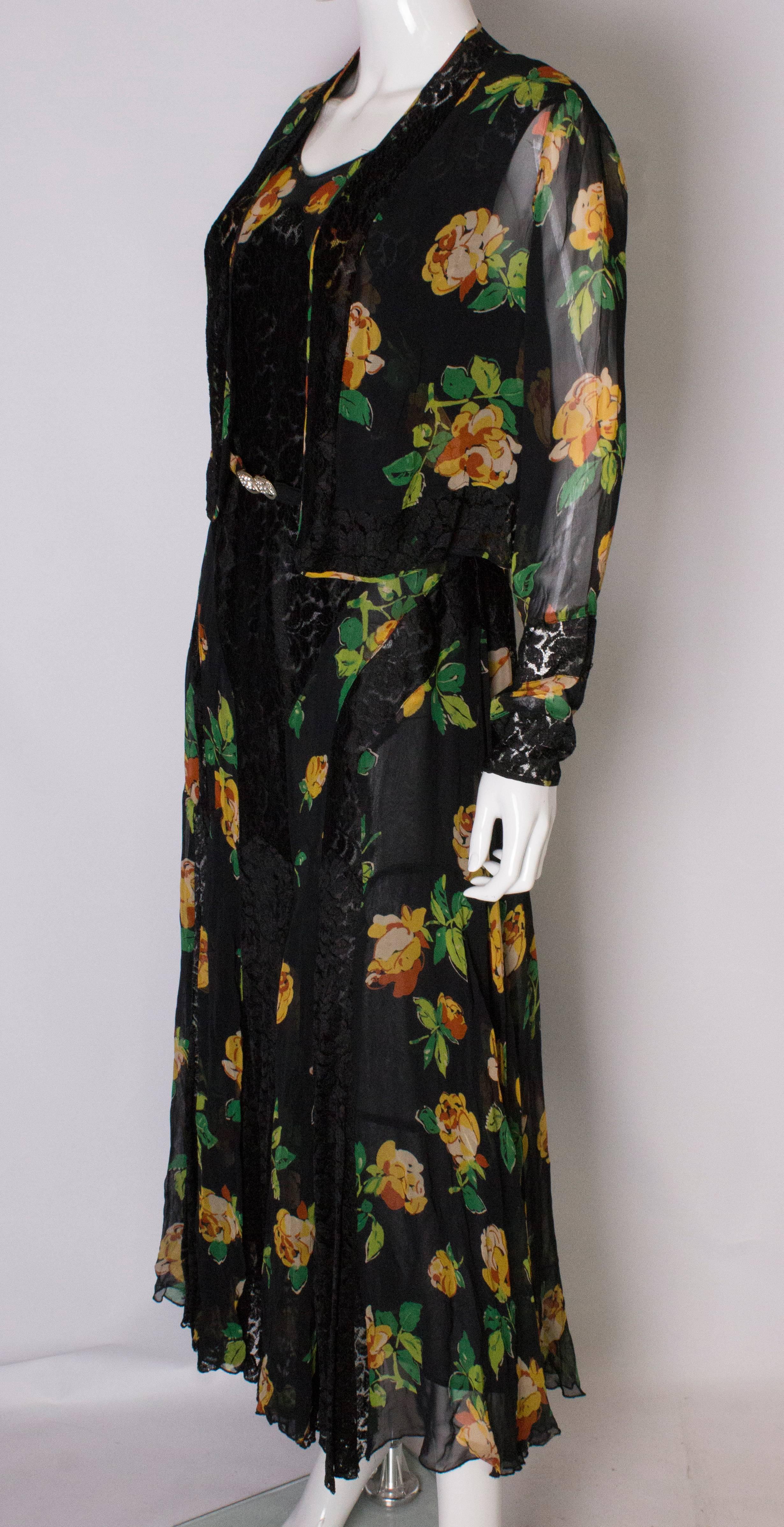 A Vintage 1920s floral silk print and black lace gown and matching bolero 1