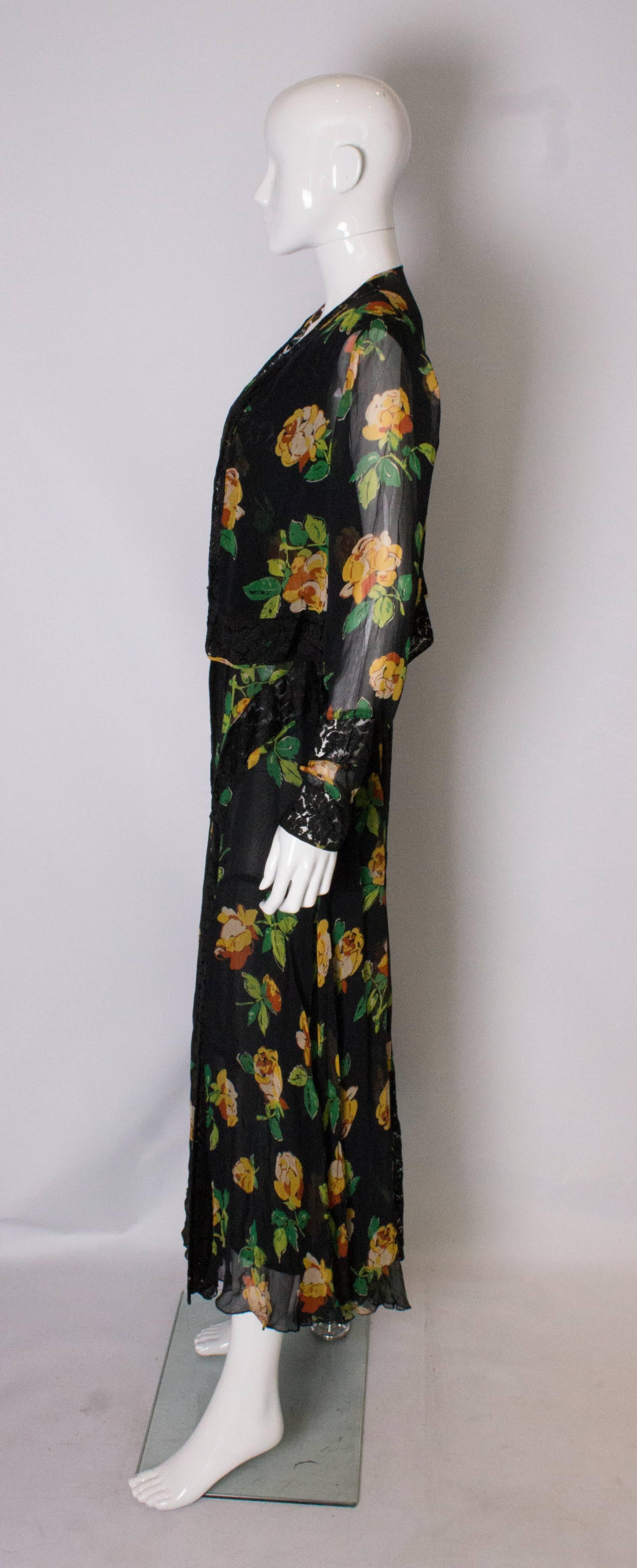 A Vintage 1920s floral silk print and black lace gown and matching bolero 2