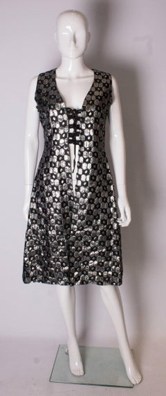 A Vintage 1960s Silver and Black metallic tie up Waistcoat dress