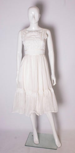 A vintage 1950s White Spotted and Lace summer Dress