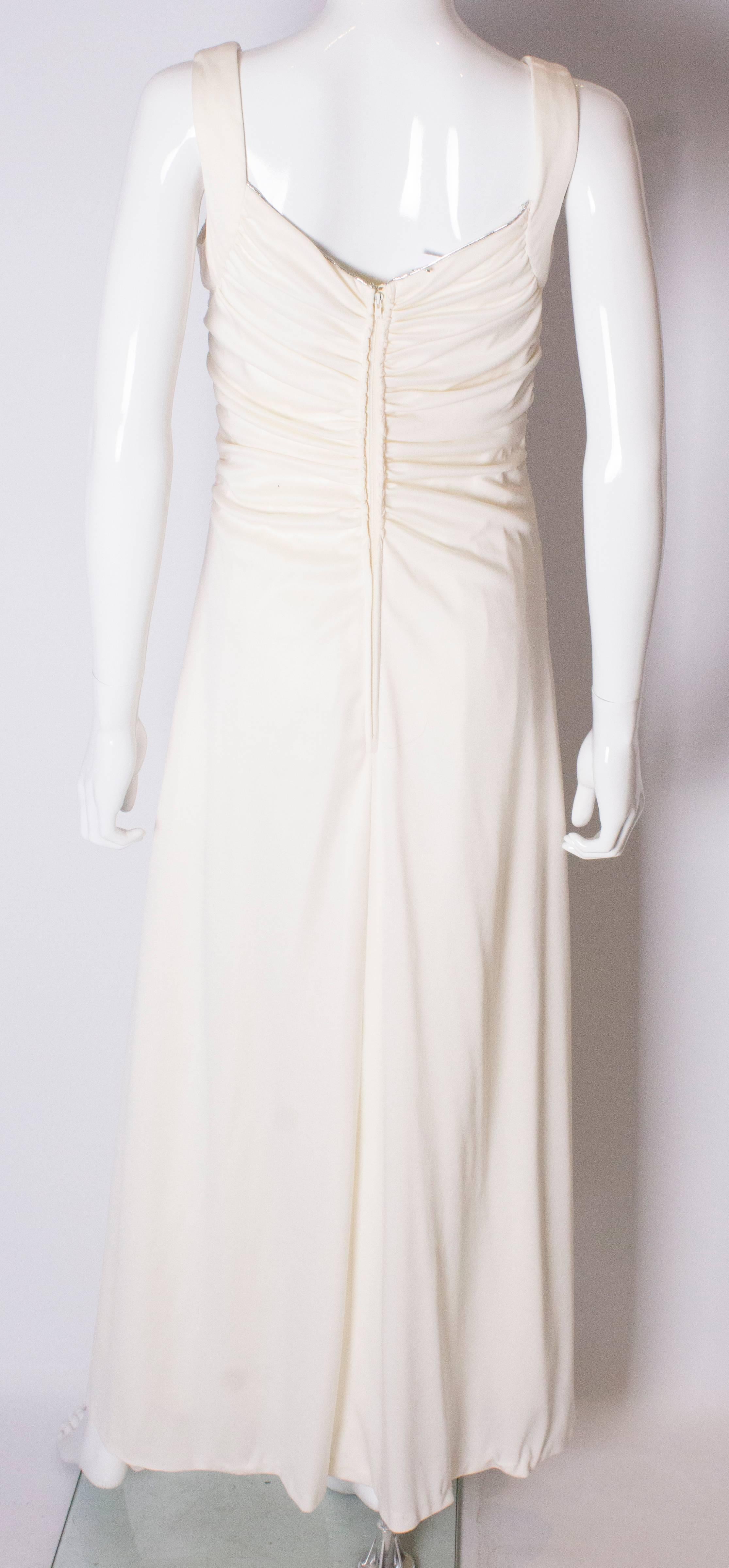 A Vintage 1970s cream evening dress by Maddison Avenue London  3