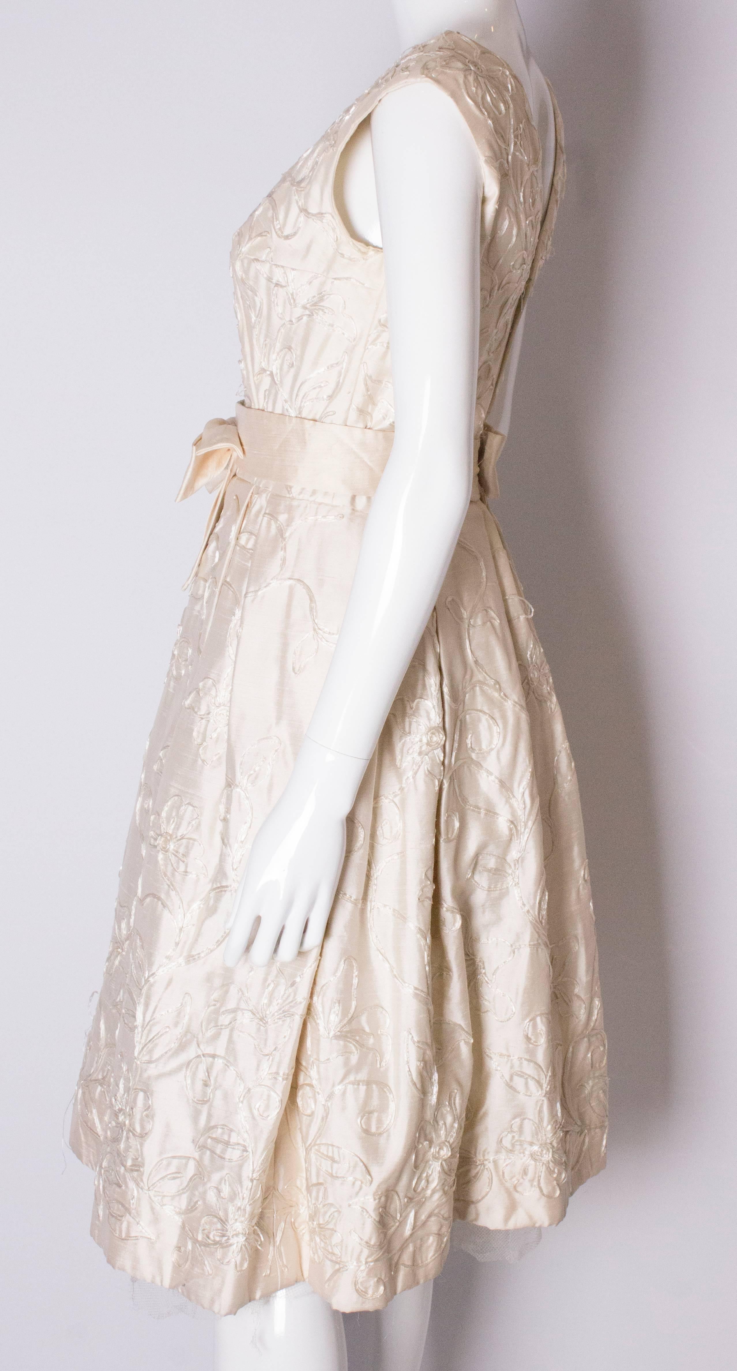 Women's A Vintage 1950s ivory cocktail bridal dress by Julian Roe for Adaire London